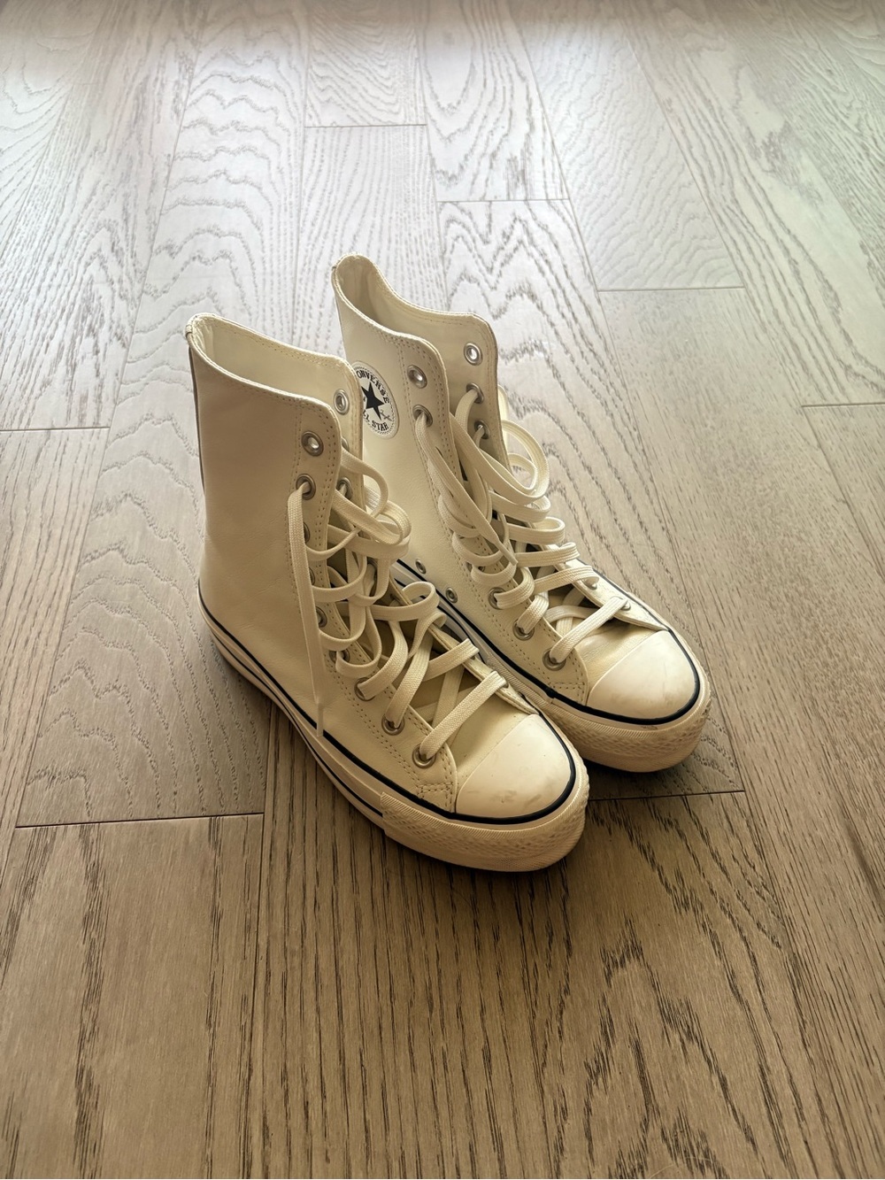 Converse High Top Sneakers in Cream